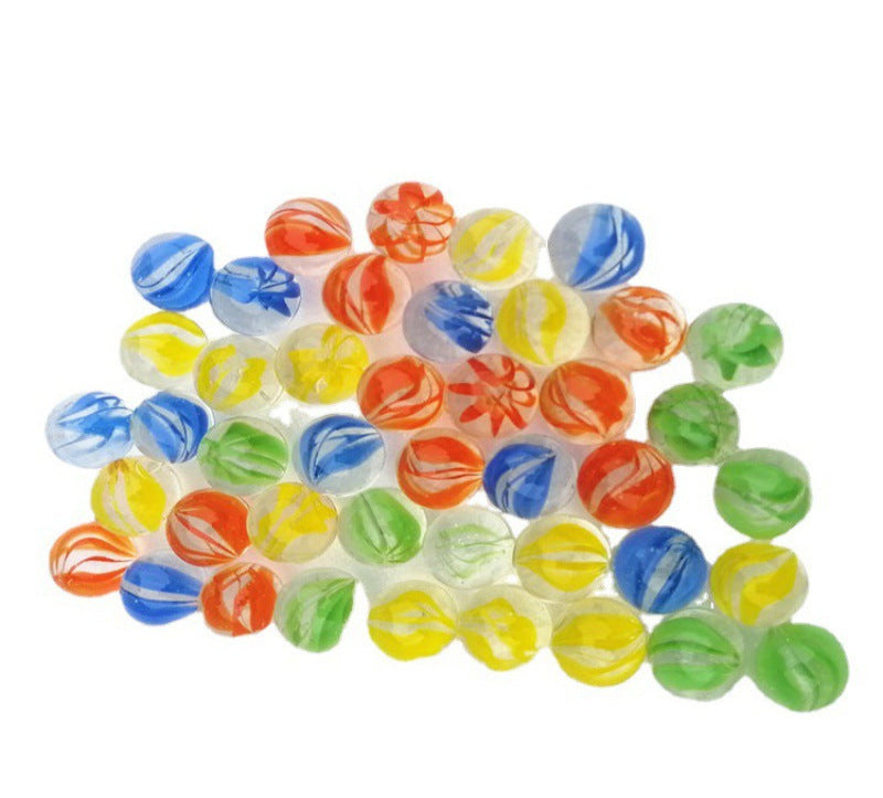 Assorted colorful marbles on a white background