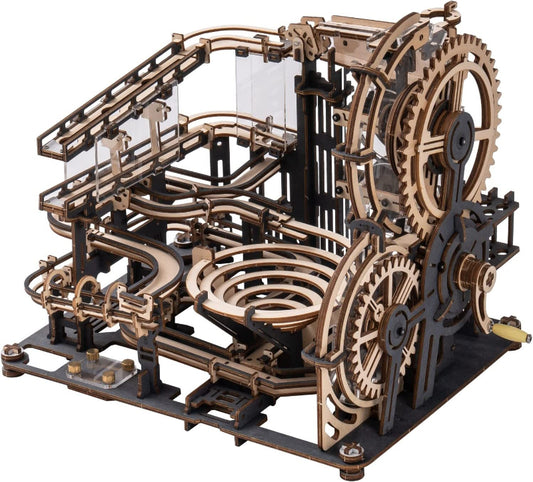Mechanical model with gears and tracks on a white background
