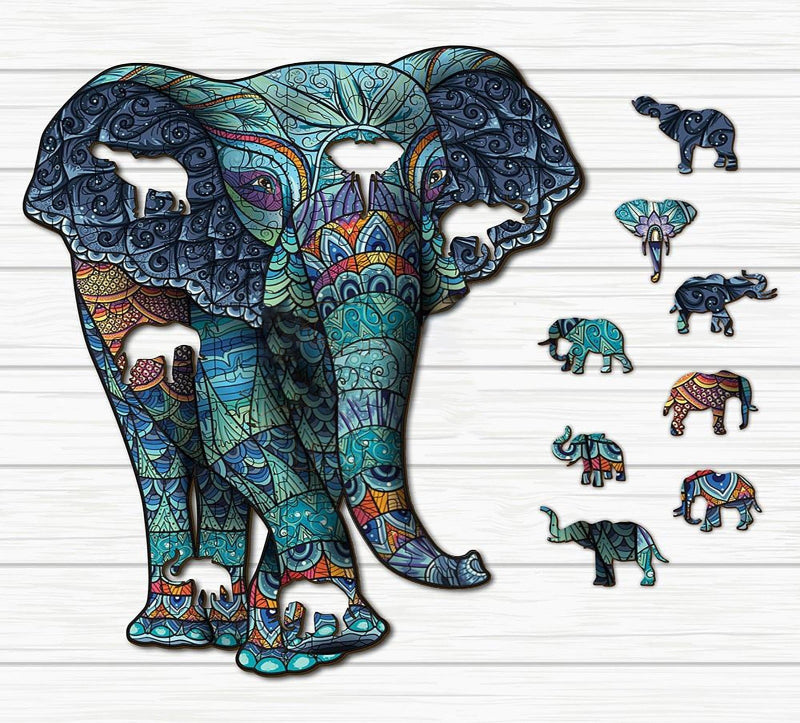 Colorful elephant cutout with smaller elephant cutouts on a white background