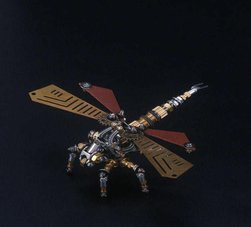 A 3D Steampunk style metal puzzle model resembling a wasp with bronze and gold details on its wings and body.
