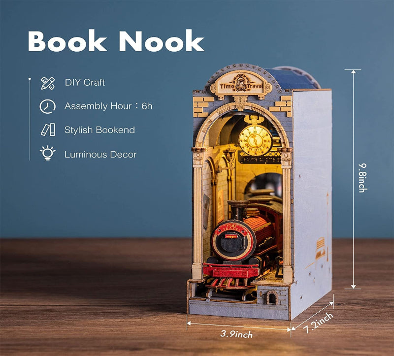 Book Nook DIY craft item with clock design on a wooden surface and blue background