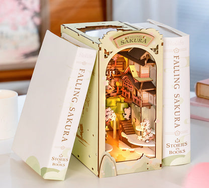 Book-shaped box with a miniature dollhouse inside, titled 'Falling Sakura'.