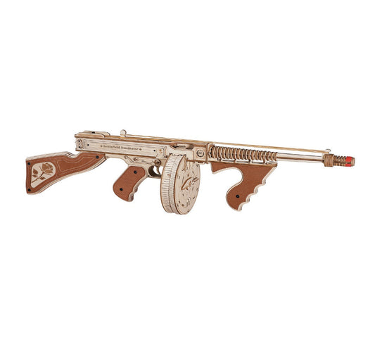 Decorative rifle with intricate design on a white background