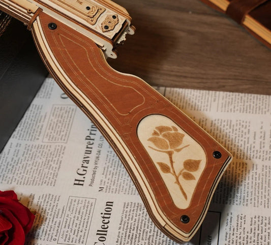 Wooden instrument with rose design on a newspaper background