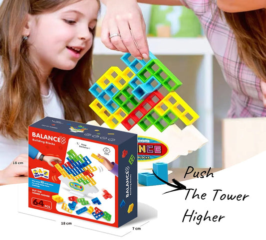 Children playing with colorful building blocks and a box labeled 'Balance Building Blocks'.
