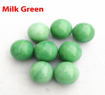 Green beads on a white fabric background with 'Milk Green' text.