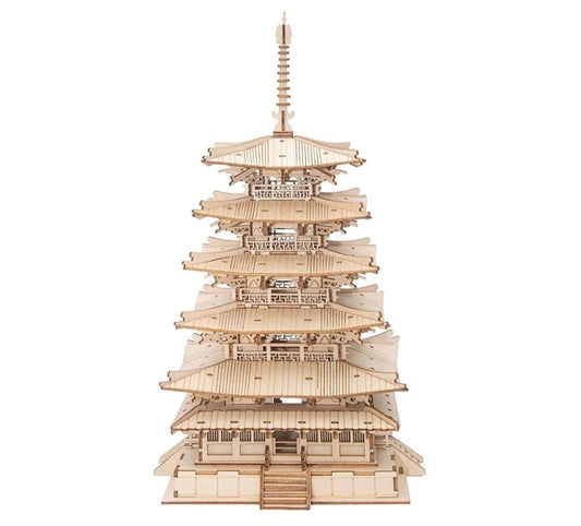 A completed 3D wooden pagoda model with multiple tiered roofs and a spire.