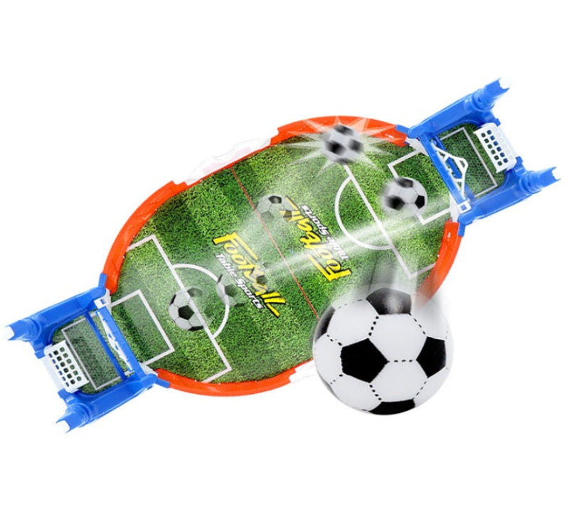 Toy soccer goal set with a ball on a white background