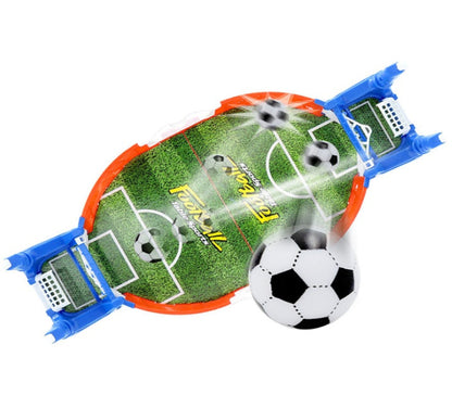 Toy soccer goal set with a ball on a white background