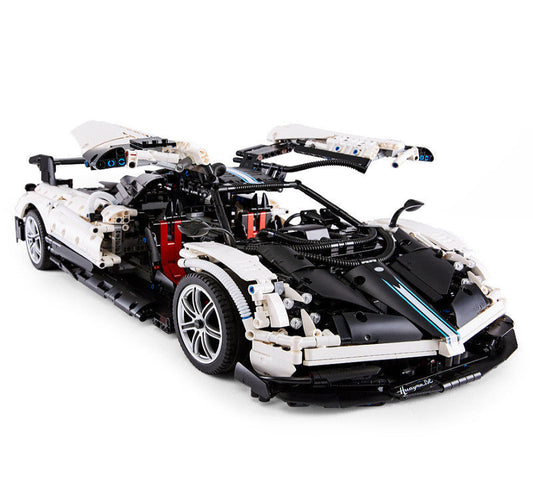 Toy car model made of interlocking bricks on a white background