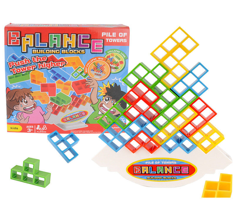 Colorful building blocks with a balance game on a white background