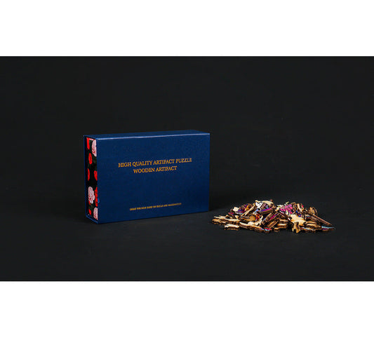Blue box labeled 'High Quality Artifact Puzzle Wooden Artifact' with scattered puzzle pieces on a black background